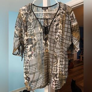 Unique Spectrum Sheer Top